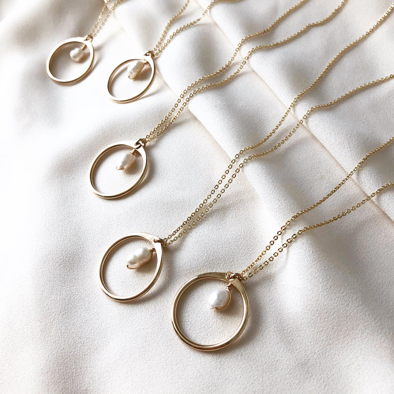 handmade, gold circle necklace with pearl and gold cable chain 