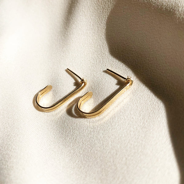 handmade earrings which are 14k gold-filled hook hoop stud earrings 